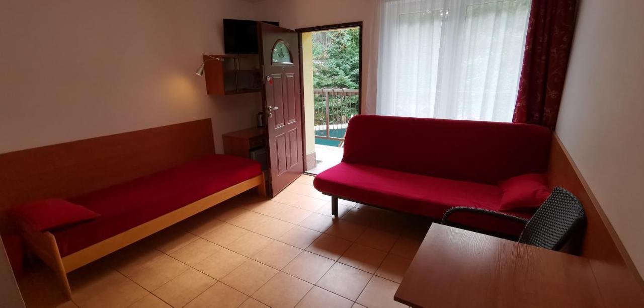 Pod Filarami Pobierowo Hotel Kültér fotó