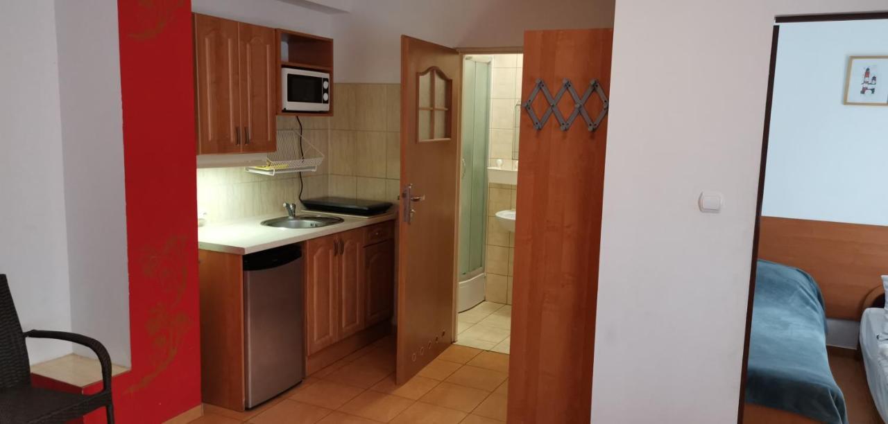 Pod Filarami Pobierowo Hotel Kültér fotó